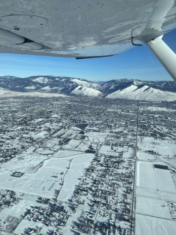 The view of Missoula from the skies above, Photo Credit Arjun Bachmann