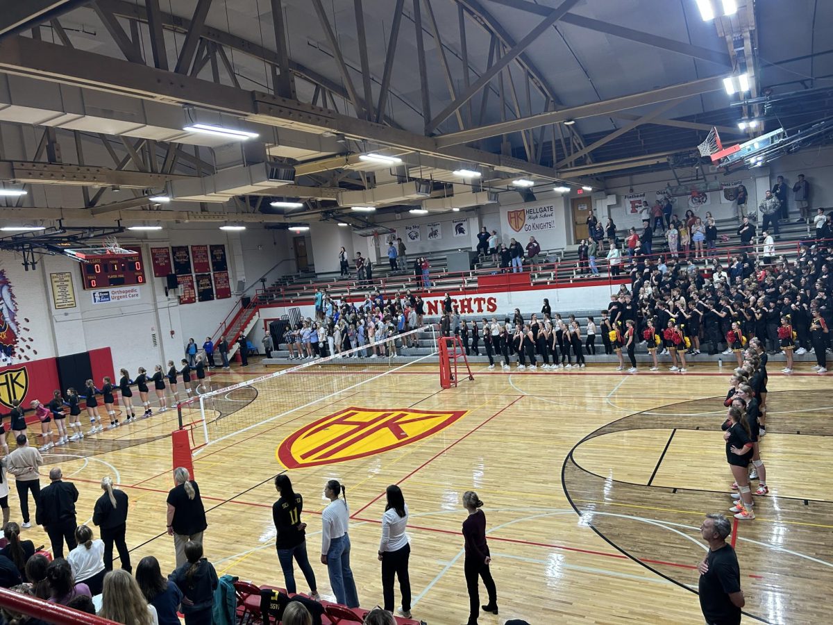 Hellgate and Big Sky stand for the national anthem prior to Tuesday nights game. 