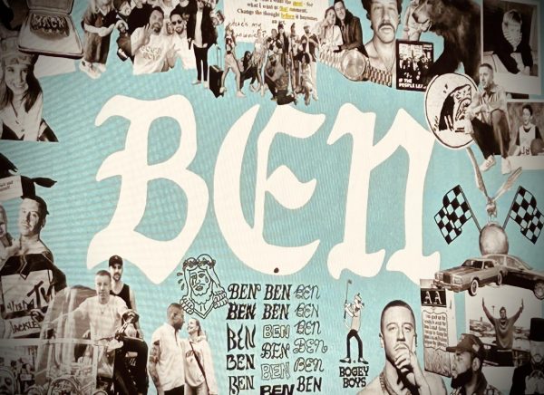The sign in the lobby of the Adams center, which is the same graphic on the tour merch; ironically, Macklemore did charge $50 for a t-shirt. Photo by Will Hansen
