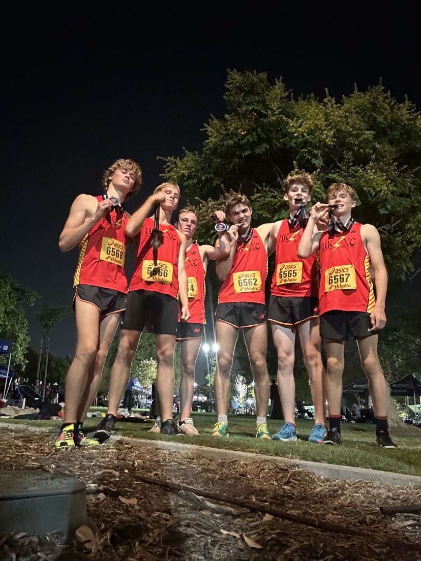 Hellgates boys varsity team poses with their medals after the Woodbridge Classic. Photo by Ridley Key. 