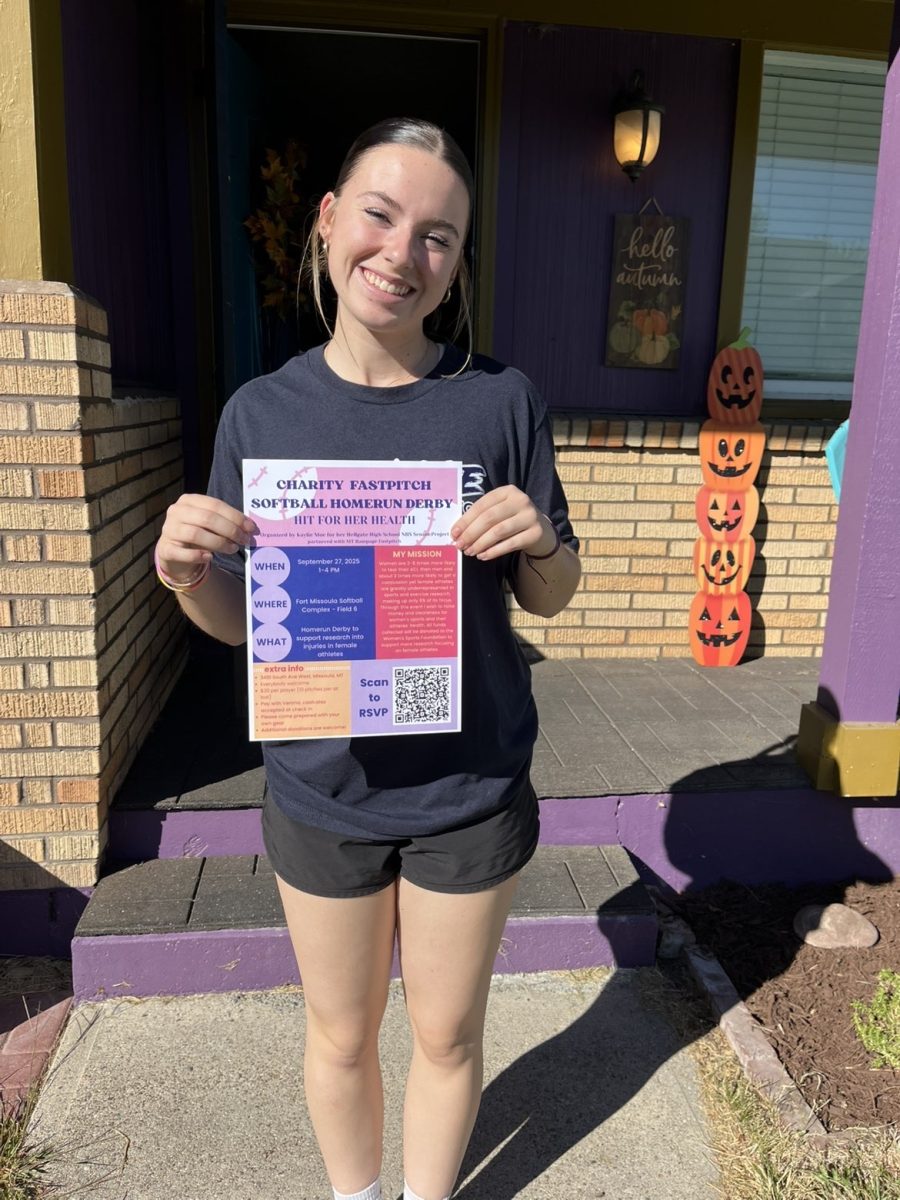 Kaylie Moe with her NHS project flyer. Photo by Piper Wells.