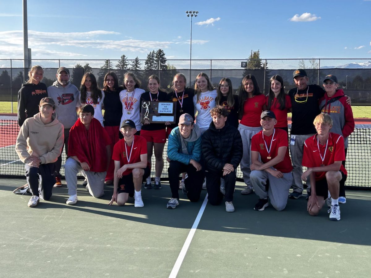 Hellgate's boys and girls tennis team pose after state competition. Photo courtesy of Hallie Banziger