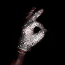 The album cover for "ICEMAN" features Michael Jackson's iconic diamond glove, which Drake recently purchased. Drake has frequently compared himself to Jackson. 